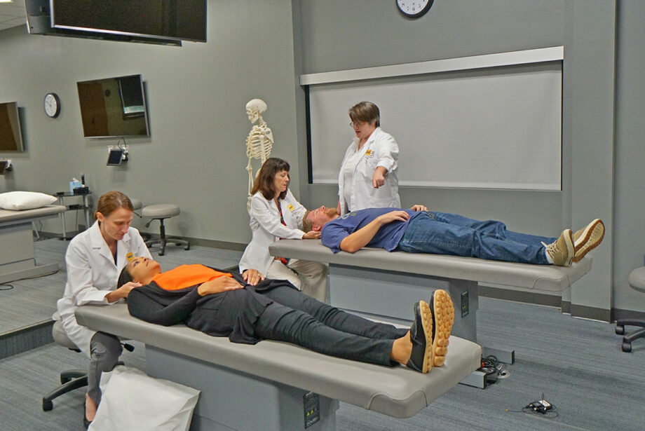 Doctors demonstrate osteopathic techniques in a high-tech training center at the New York Institute of Technology College of Osteopathic Medicine in Wilson Hall on the campus of Arkansas State University in Jonesboro.