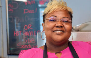 La’Twana Scott, owner of Sweet Mama T’s restaurant in El Dorado, was a 911 dispatcher in town before “stepping out on faith” to open her own business.