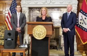 From left to right: Arkansas Economic Development Commission Executive Director&nbsp;Mike Preston, Aerojet Rocketdyne President and CEO&nbsp;Eileen Drake and Gov. Asa Hutchinson.