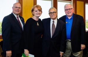 Mike Hutchison, Arkansas Tech University vice president for advancement;&nbsp; Robin Bowen, ATU president; Bert Mullens, distinguished alumnus of ATU; and Charles Blanchard, chairman of the ATU Board of Trustees.