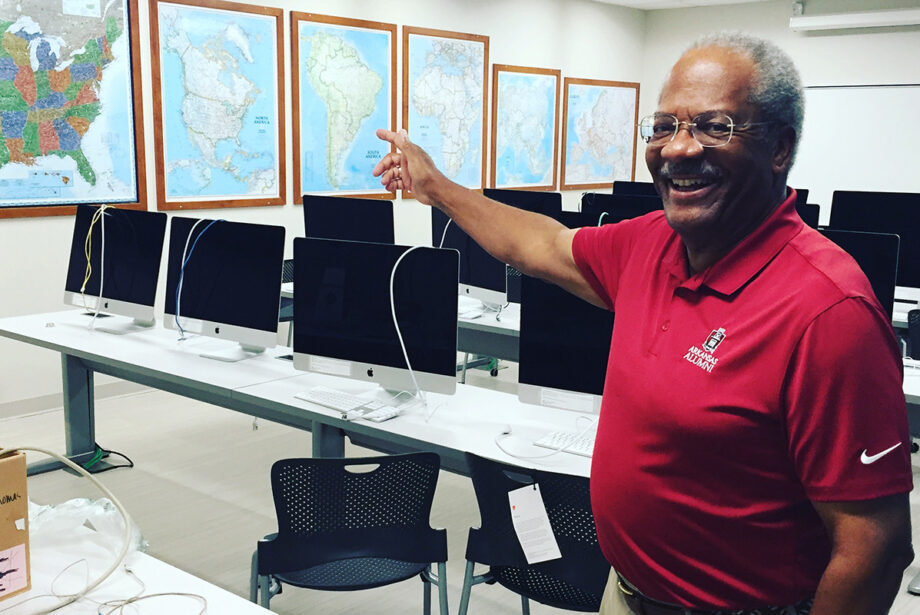 Professor Gerald Jordan in the new converged newsroom of the University of Arkansas’ fully accredited School of Journalism and Strategic Media, which has new facilities to go with its new name.