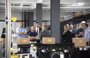 Hytrol executives give a tour of its newly renovated, 45,000-SF Technology Center.