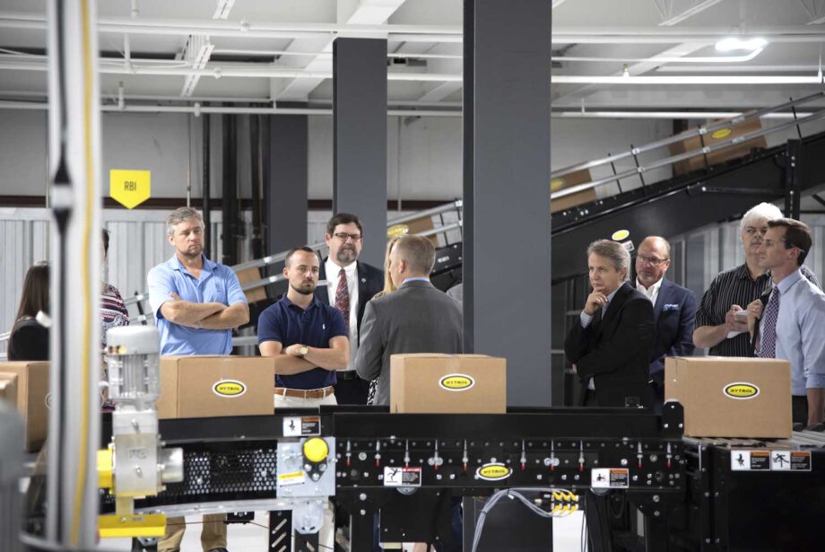 Hytrol executives give a tour of its newly renovated, 45,000-SF Technology Center.