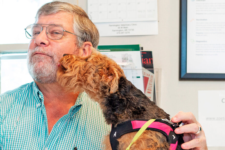 Alan Thompson with a friendly patient at Farmington Veterinary Clinic in northwest Arkansas. Thompson sold his practice to Pathway Vet Alliance of Austin, Texas, which has acquired some 150 veterinarian clinics in the United States.