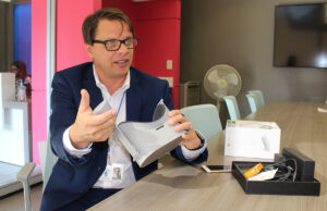 Bill Solleder, Visit Hot Springs&rsquo; marketing chief, with his Oculus Go unit.