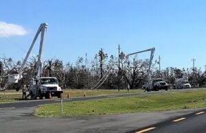 Crews from the Electric Cooperatives of Arkansas working to restore power in the wake of Hurricane Michael.