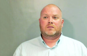 Adam Waldron's booking photo from August 2018.