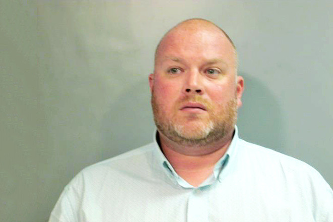 Adam Waldron's booking photo from August 2018.