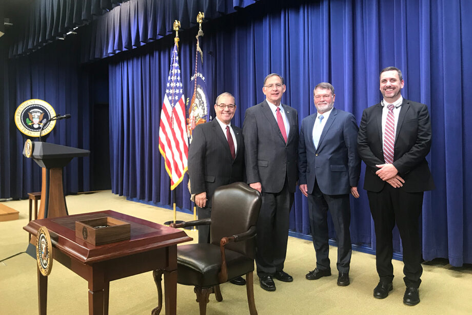 Farm Bureau President Randy Veach, U.S. Sen. John Boozman, Farm Bureau Board Member Terry Dabbs and Matt King, Farm Bureau director of public affairs and government relations, stand onstage before the signing ceremony of the 2018 Farm Bill in Washington, D.C.