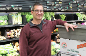 Mike Anzalone, general manager of Ozark Natural Foods in Fayetteville, had a debt-shedding plan for his grocery co-op to weather the storm brought by a Whole Foods Market opening nearby.