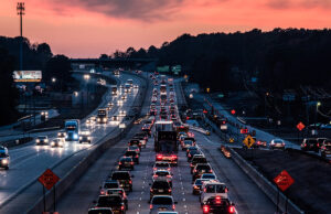 Traffic proceeds on Interstate 30 in Little Rock during evening rush hour.