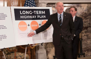 Gov. Asa Hutchinson announces his plan for building and repairing Arkansas roads at a Feb. 11 press conference at the Capitol.