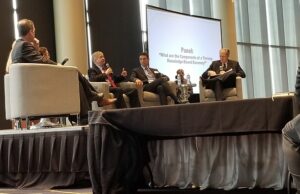 Dr. Richard Brown, dean of the College of Engineer at the Univeristy of Utah, speaks Tuesday during a panel at the first-ever Arkansas Innovation Council Summit in the Robinson Center's ballroom in Little Rock.