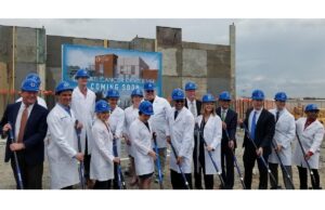 CARTI personnel and others break ground on the nonprofit's new cancer treatment center in North Little Rock.