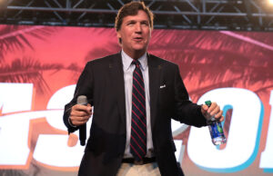 Tucker Carlson speaking with attendees at the 2018 Student Action Summit hosted by Turning Point USA at the Palm Beach County Convention Center in West Palm Beach, Florida.