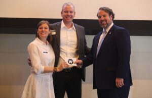 From left, Staley House Founders Misti and Will Staley with DRA Chairman Caldwell.