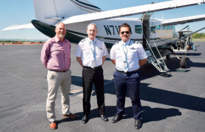 Airport Director Glen Barentine, left, with Southern Airways Express pilots Terry Thomason and Faafouina Faaiu in front of their Cessna 208B, which they use to fly up to nine passengers per trip between Hot Springs and Dallas.