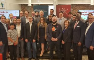 Executives of startups selected for FIS' and the Venture Center's 2019 Fintech Accelerator pose for a group photo with community leaders, Venture Center staff and others at the kickoff event for the program.