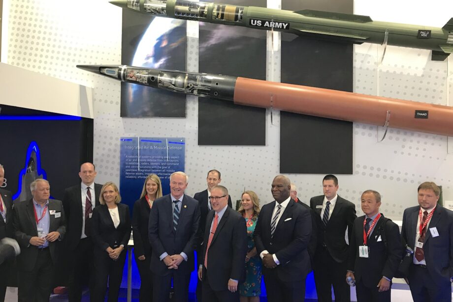 Gov. Asa Hutchinson stands next to Frank St. John,&nbsp;executive vice president of Lockheed&nbsp;Martin Missiles and Fire Control, at the Paris Air Show. Lockheed Martin plans to spend $142 million to expand its plant in East Camden.
