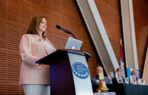 Olivia Farrell accepts the Little Rock Rotary Club&rsquo;s 2019 Business and Professional Leader of the Year award.