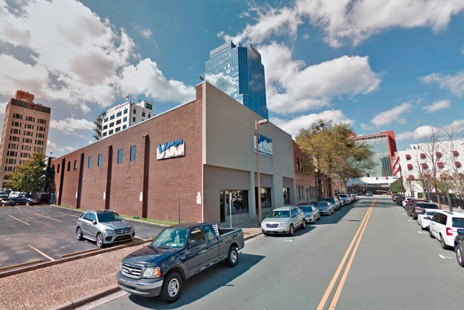 The former home of the VCC general contracting firm is marked for proposed redevelopment as a parking lot, along with two neighboring office buildings.