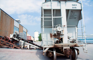 A train car sits on a loading dock at the Little Rock Port Authority.