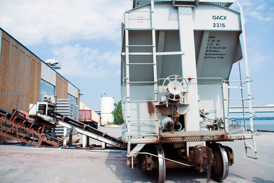 A train car sits on a loading dock at the Little Rock Port Authority.