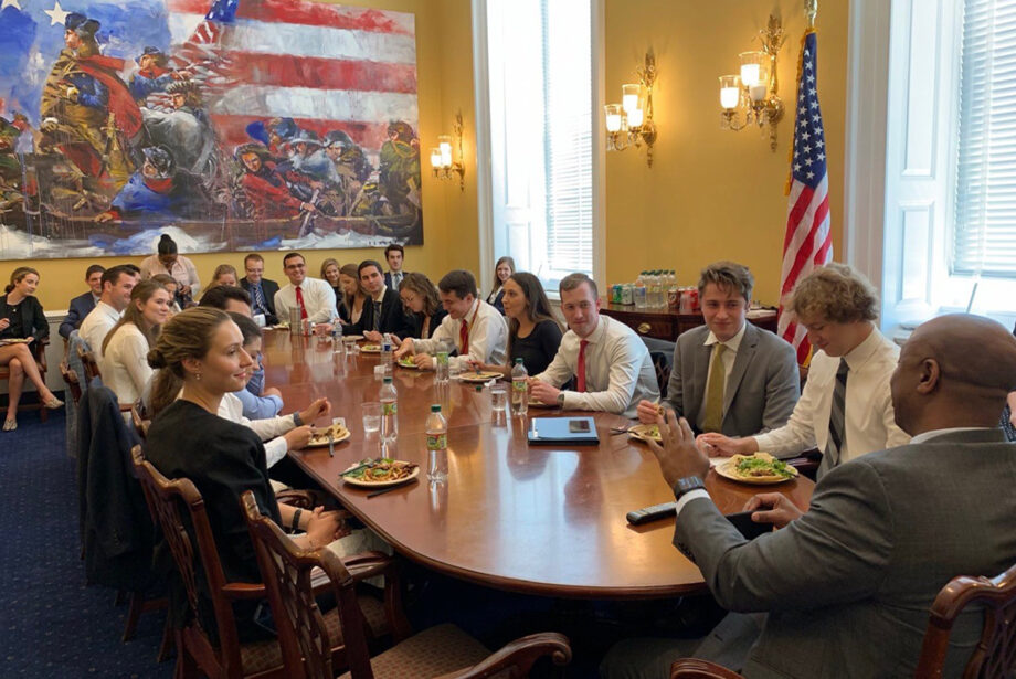 Sen. Tim Scott (back to camera), R-S.C., lunches with congressional interns at the U.S. Capitol July 17.