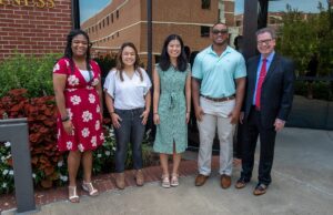 From left, Botham Jean Scholarship receipients Courtney Porter, Brittany Tate, Yui Kondo and Tonio Montez with Allen Frazier, Dean of the College of Business at Harding University.
&nbsp;
&nbsp;