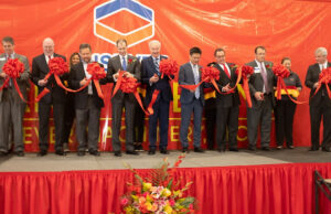 Heifei Risever Machinery Co. Ltd officials, along with state and local leaders, cut the ribbon for the company's new plant in Jonesboro.