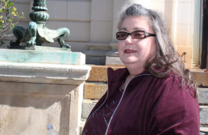 Donna Herring walks outside of the U.S. District Courthouse in El Dorado on Tuesday. She was sentenced to 41 months in prison for forging a fake will for Deepwater Horizon survivor Matthew Seth Jacobs.