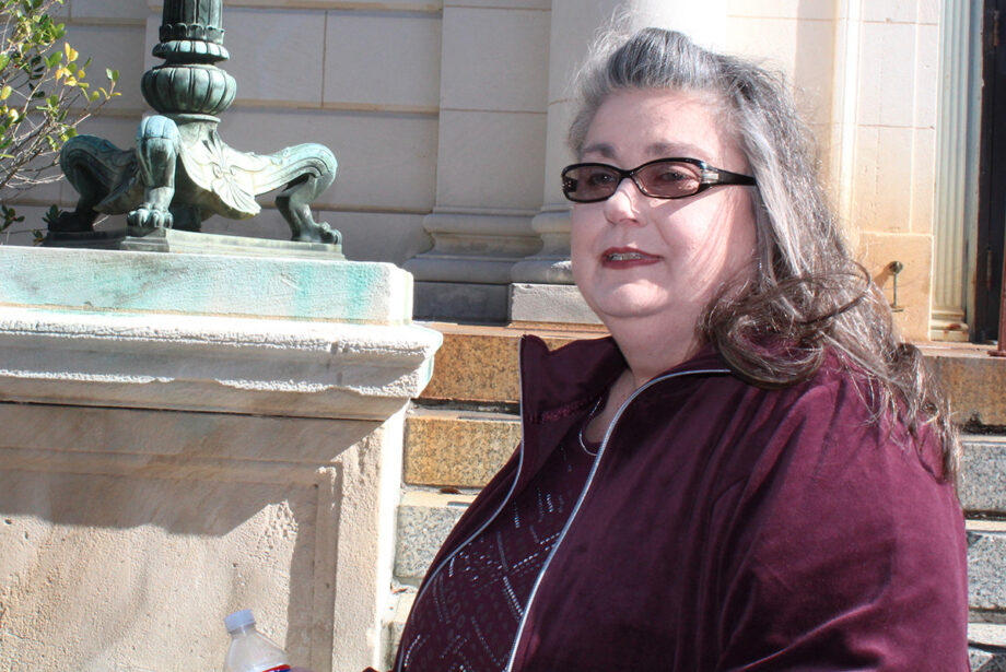 Donna Herring walks outside of the U.S. District Courthouse in El Dorado on Tuesday. She was sentenced to 41 months in prison for forging a fake will for Deepwater Horizon survivor Matthew Seth Jacobs.