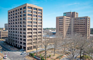 Baptist Health faces a challenge from a Little Rock firefighter over its billing practices, which placed a lien against him instead of first filing a claim with his health insurer.