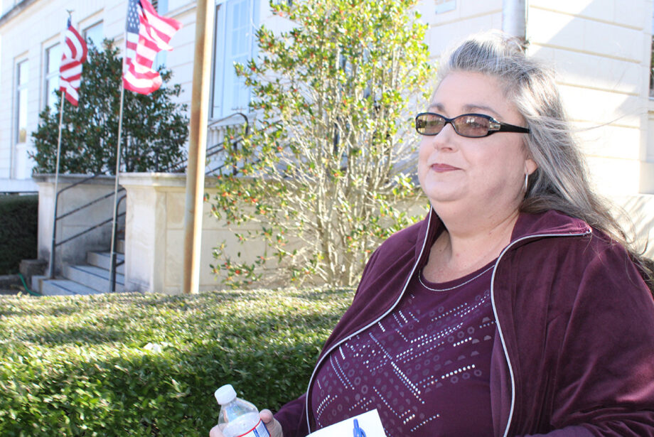 Donna Herring walks outside of the U.S. District Courthouse in El Dorado on Tuesday. She was sentenced to 41 months in prison for forging a fake will for Deepwater Horizon survivor Matthew Seth Jacobs.