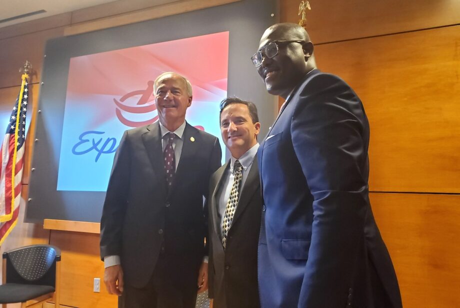 From left, Gov. Asa Hutchinson, Express Rx CEO&nbsp;Galen Perkins and Little Rock Mayor Frank Scott Jr. pose for a photo after announcing that the company has opened its new headquarters in the city.