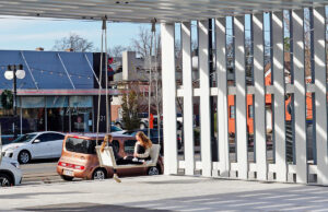 The “front porch” area of Argenta Plaza in North Little Rock drew a couple of visitors to the pergola’s swings last week.