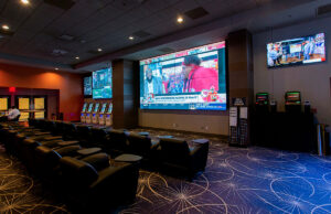 Oaklawn's sportsbook offers a theater-like ambiance for bettors.