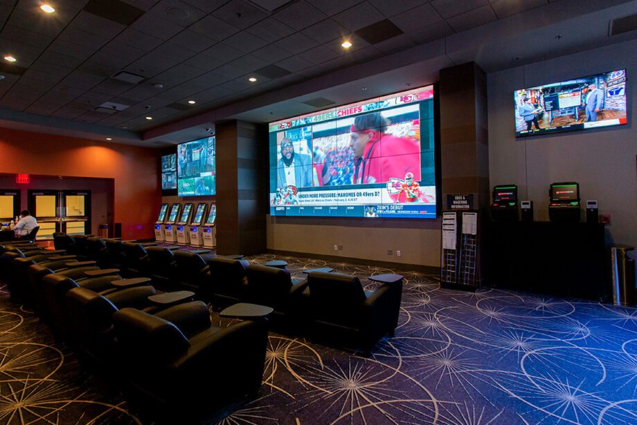 Oaklawn's sportsbook offers a theater-like ambiance for bettors.