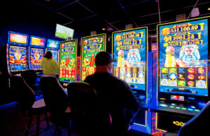 Gamblers enjoying the modern slot machines at the Saracen Annex in Pine Bluff earlier this month.  Casino gaming made its debut in Arkansas in 2019.