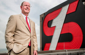 George Makris, CEO of Simmons First National Corp., stands atop the state's tallest building, the Simmons Tower, in 2015.