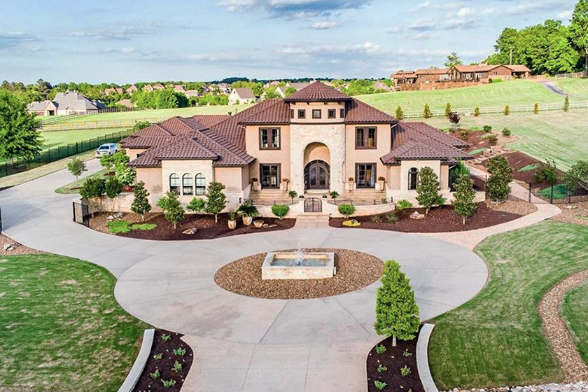 An 8,400-SF home in Fayetteville's Bridgewater Estates will stay in the Arkansas Razorbacks family for the time being.