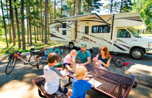 A family picnics at Petit Jean State Park