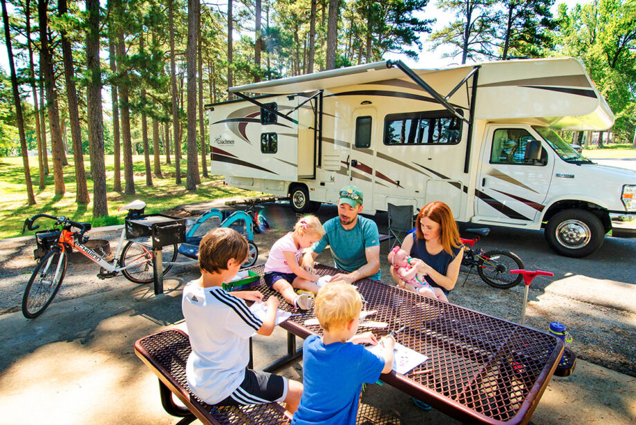 A family picnics at Petit Jean State Park