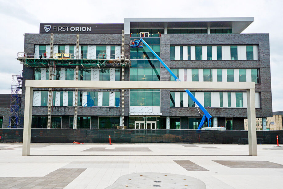 The First Orion Building, framed by a piece of Argenta Plaza, is a $15 million, 72,000-SF project including offices, a commercial gym and a Tusk & Trotter restaurant.