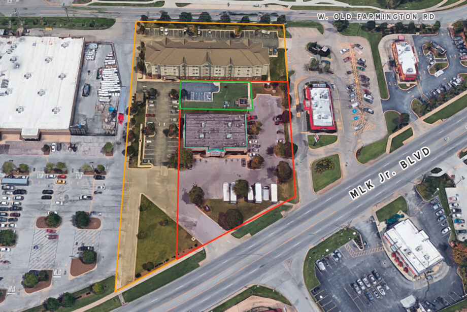 Golden Hospitality LLC, the owner of the Candlewood Suites shown above, owns the parcels outlined in yellow. SCE Properties LLC plans to build a Kum & Go store on its land, outlined in red. While the area outlined in green is within SCE's parcels, Golden Hospitality is asking for the area to be designated a prescriptive easement. (Parcel lines are approximate.)