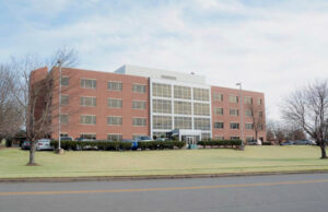 The four-story office building at 1001 Technology Drive in west Little Rock is a former branch of Acxiom.