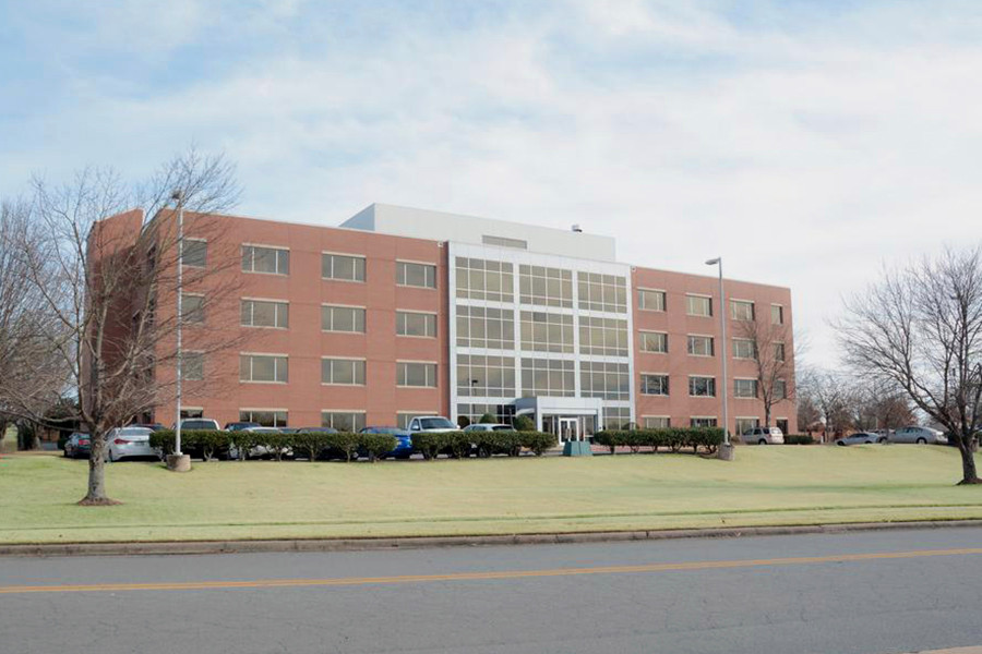 The four-story office building at 1001 Technology Drive in west Little Rock is a former branch of Acxiom.