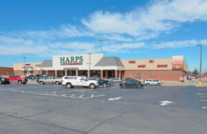 Harps Food Store at 2894 W. Sunset Ave in Springdale. The company's corporate headquarters can be seen in the background on the right.