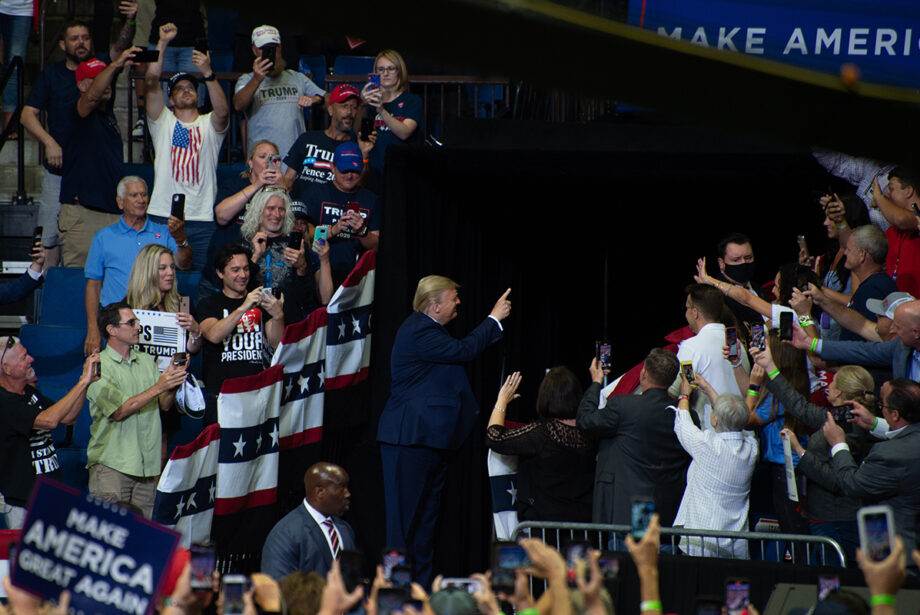 President Donald Trump acknowledges a supporter at a campaign rally held June 20 at the Bank of Oklahoma Center in Tulsa.