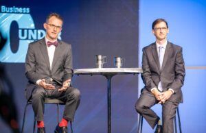Arkansas Business Publisher Mitch Bettis (left) and Online Editor Lance Turner host the 40 Under 40 event.
